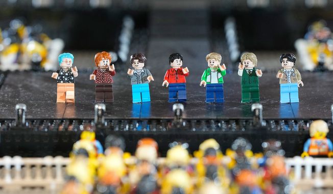 A LEGO set made of its blocks featuring K-pop band BTS, is displayed during a publicity event at a store in Seoul, South Korea, Thursday, March 2, 2023. (Associated Press)