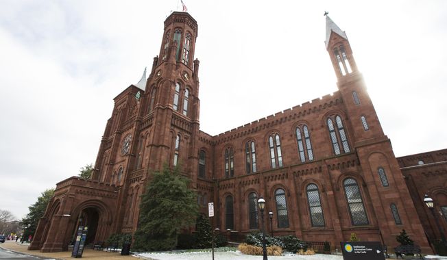 The Smithsonian Institution&#x27;s Smithsonian Castle is seen at the National Mall in Washington, Tuesday, Jan. 27, 2015. The Smithsonian Institution is working to establish its first international museum outpost in London as the city redevelops its Olympic park. (AP Photo/Manuel Balce Ceneta)