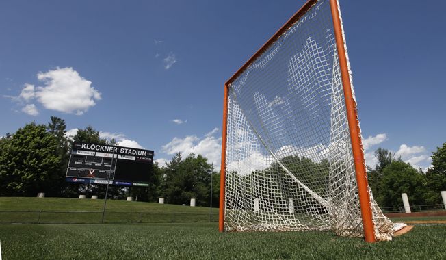 A Lacrosse goal stands empty at Klockner Stadium on the campus of the University of Virginia in Charlottesville, Va., Tuesday, May 4, 2010.  (AP Photo/Steve Helber) **FILE**