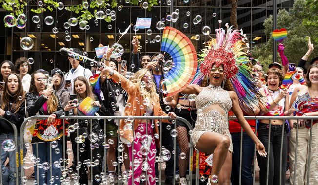 Revelers celebrate during San Francisco&#x27;s Pride Parade on Sunday, June 25, 2023. (AP Photo/Noah Berger)