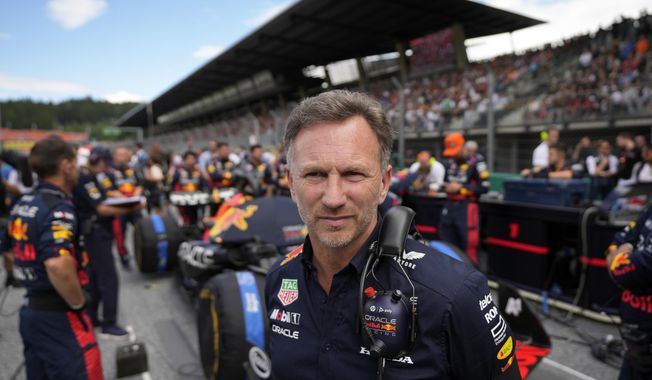 Red Bull team principal Christian Horner stands around before the start of the Formula One Austrian Grand Prix auto race, at the Red Bull Ring racetrack, in Spielberg, Austria, Sunday, July 2, 2023. (AP Photo/Darko Vojinovic)