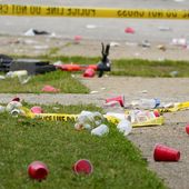 Party debris is seen in the area of a mass shooting incident in the Southern District of Baltimore, Sunday, July 2, 2023. Baltimore leaders are condemning what they called a “catastrophic breakdown” in how city police responded to 911 calls leading up to a mass shooting at a neighborhood block party earlier this month. Police received a call about hundreds of partygoers armed with guns and knives about three hours before the shooting, but on-duty officers decided no law enforcement services were required.(AP Photo/Julio Cortez, File)