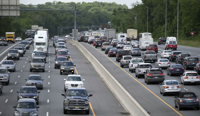 The.Capital Beltway is known for rush-hour slowdowns, such as this one from May 23, 2014, in Hyattsville, Maryland. Another snarl came Tuesday, thanks to the Inner Loop being closed off to accommodate a drive by President Biden from the White House to Chevy Chase for a fundraiser. (AP Photo/Carolyn Kaster, File) **FILE**