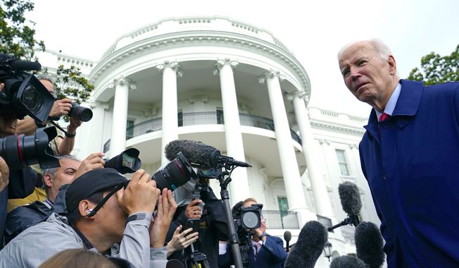 President Biden talks with reporters before boarding Marine One on the South Lawn of the White House in Washington, Monday, May 29, 2023. (AP Photo/Susan Walsh)