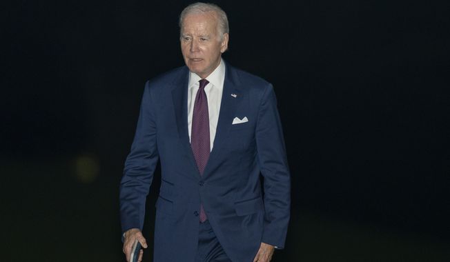President Joe Biden walks on the South Lawn upon arrival at the White House from a trip to New York, Thursday, June 29, 2023, in Washington. (AP Photo/Manuel Balce Ceneta)