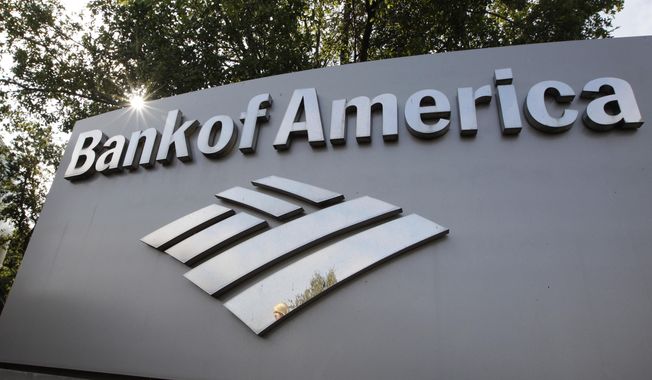 FILE - A Bank of America logo is displayed at a branch office in Palo Alto, Calif., Monday, Sept. 12, 2011. The Boston Marathon has agreed to a 10-year sponsorship deal with Bank of America that organizers hope will allow the world’s oldest and most prestigious annual 26.2-mile road race to grow over the next decade while maintaining its historic character. Financial terms of the deal announced Monday, March 27, 2023, were not disclosed. (AP Photo/Paul Sakuma, File)