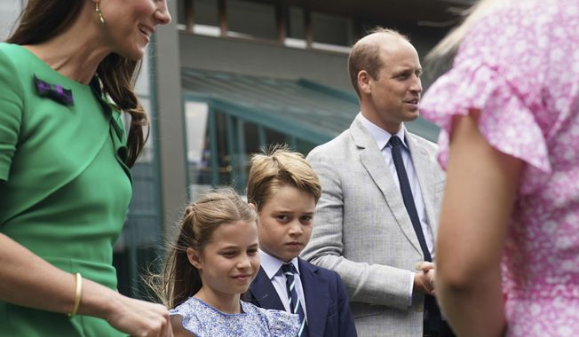 The Prince and Princess of Wales with Prince George and Princess Charlotte arrive on day fourteen of the 2023 Wimbledon Championships at the All England Lawn Tennis and Croquet Club in Wimbledon, Sunday July 16, 2023. (Victoria Jones/Pool photo via AP)