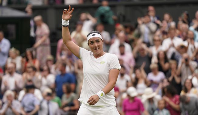 Tunisia&#x27;s Ons Jabeur celebrates beating Aryna Sabalenka of Belarus to win their women&#x27;s singles semifinal match on day eleven of the Wimbledon tennis championships in London, Thursday, July 13, 2023. (AP Photo/Alberto Pezzali)