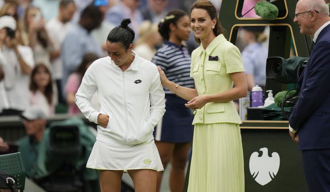 Tunisia&#x27;s Ons Jabeur speaks with Britain&#x27;s Kate, Princess of Wales after losing to Czech Republic&#x27;s Marketa Vondrousova in the women&#x27;s singles final on day thirteen of the Wimbledon tennis championships in London, Saturday, July 15, 2023. (AP Photo/Alastair Grant)