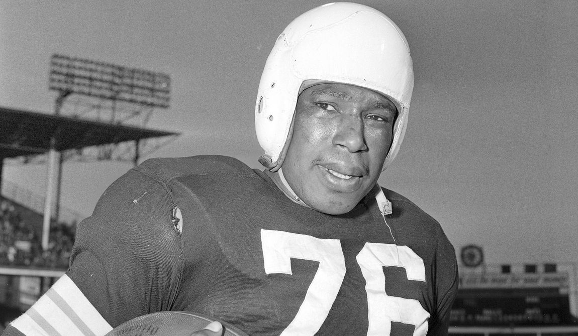 Cleveland Browns NFL football player Marion Motley is shown Dec. 5, 1948, in Cleveland. The Cleveland Browns will shelve those classic logo-less orange helmets for three games this season. With a nod to the team&#x27;s storied past, the Browns will wear white helmets for the first time since 1951. (AP Photo/Harry Hall, File)