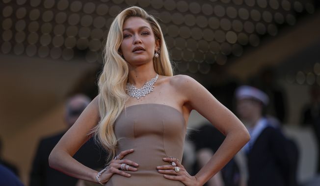 Gigi Hadid poses for photographers at the premiere of the film &#x27;Firebrand&#x27; at the 76th international film festival in Cannes, France, May 21, 2023. Hadid and a friend are on vacation in the Cayman Islands after the Customs and Border Control said on Tuesday, July 18, 2023 that they arrested the two for marijuana possession and later released them. (AP Photo/Daniel Cole, File)