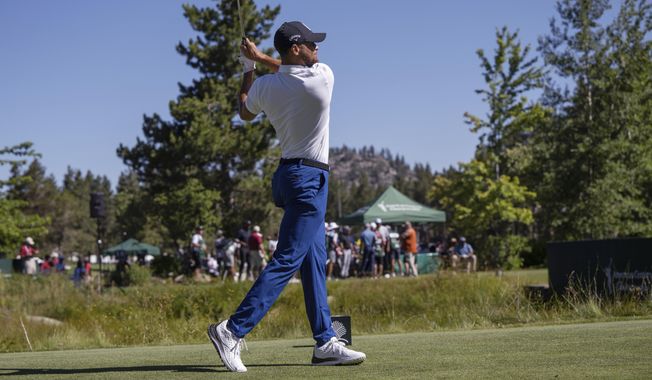 Stephen Curry watches a tee shot Friday, July 14, 2023, during the first round of the American Century Championship celebrity golf tournament at Edgewood Tahoe Golf Course in Stateline, Nev. (Hector Amezcua/The Sacramento Bee via AP)