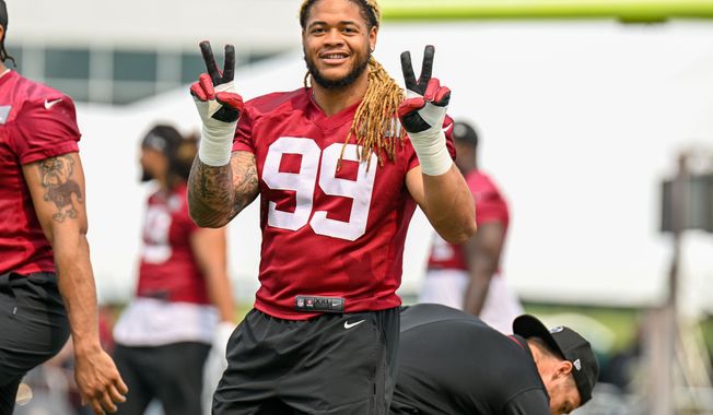 ASHBURN, Va.  Chase Young (99), is all smiles on the first day of  mandatory minicamp from the OrthoVirginia Training Center at Commanders Park.  (Photo: Joe Glorioso | All-Pro Reels)