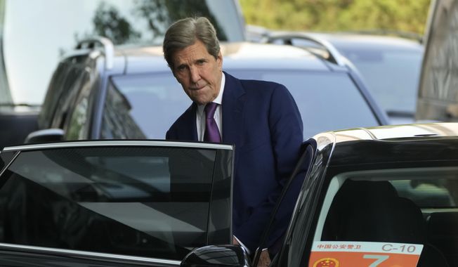 U.S. Special Presidential Envoy for Climate John Kerry gets into a vehicle at a hotel as he heads to meet Chinese officials in Beijing, Tuesday, July 18, 2023. Kerry is holding talks with his Chinese counterpart in Beijing as the U.S. seeks to restore contacts with China that were disrupted by disputes over trade, Taiwan, human rights and territorial claims. (AP Photo/Andy Wong)