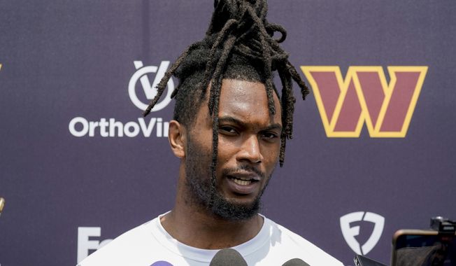 Washington Commanders safety Kamren Curl (31) speaks during a media availability after an NFL football practice at the team&#x27;s training facility, Wednesday, May 24, 2023 in Ashburn, Va. (AP Photo/Alex Brandon)