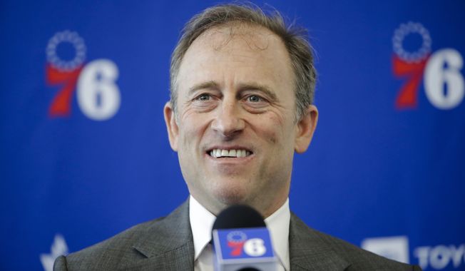 Philadelphia 76ers owner Josh Harris speaks with members of the media during a news conference at the NBA basketball team&#x27;s practice facility in Camden, N.J., Tuesday, May 14, 2019. A group led by Josh Harris and Mitchell Rales that includes Magic Johnson has an agreement in principle to buy the NFL&#x27;s Washington Commanders from longtime owner Dan Snyder for a North American professional sports team record $6 billion, according to a person with knowledge of the situation. The person spoke to The Associated Press on condition of anonymity Thursday, April 13, 2023, because the deal had not been announced. (AP Photo/Matt Rourke, File) **FILE**