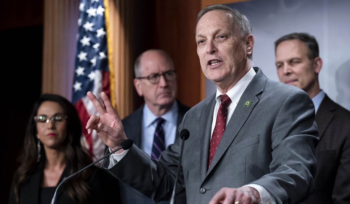 Rep. Andy Biggs, R-Ariz., joined by other members of the conservative House Freedom Caucus, speaks at a news conference on the debt limit, at the Capitol in Washington, Wednesday, March 22, 2023. (AP Photo/J. Scott Applewhite)
