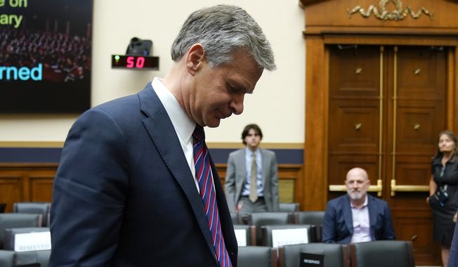 FBI Director Christopher Wray departs after testifying before a House Committee on the Judiciary oversight hearing, Wednesday, July 12, 2023, on Capitol Hill in Washington. (AP Photo/Patrick Semansky)