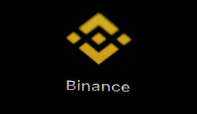The Binance app icon is seen on a smartphone, Feb. 28, 2023, in Marple Township, Pa. The U.S. Securities and Exchange Commission and Binance have reached an agreement in court, Saturday, June 17, that lets the world&#x27;s largest cryptocurrency exchange continue to operate in the United States as it battles SEC fraud charges. (AP Photo/Matt Slocum, File)