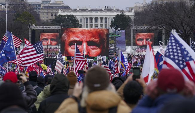 Supporters of President Donald Trump participate in a rally in Washington, Jan. 6, 2021. Most Republican candidates running for state legislature this year in Virginia are centering their pitches to voters on issues such as education, the cost of living and gun rights. But among a segment of contenders, former President Donald Trump’s false claims of a rigged 2020 election have become an important campaign selling point ahead of Tuesday’s primary. (AP Photo/John Minchillo, File)