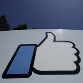This April 25, 2019, file photo shows the thumbs-up &quot;Like&quot; logo on a sign at Facebook headquarters in Menlo Park, Calif. Amid a crush of bad publicity, governmental scrutiny and growing competition for its social media business, the company is hiring workers and making products to create the “metaverse,&quot; essentially a new computing platform and “a new phase of interconnected virtual experiences using technologies like virtual and augmented reality,&quot; according to company officials. (AP Photo/Jeff Chiu, File)  **FILE**
