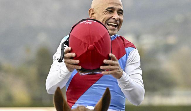 Jockey Mike Smith reacts after riding Taiba and winning the Malibu Stakes (Grade 1) race during opening day of the winter-spring meet at Santa Anita Park in Arcadia, Calif., Monday, Dec. 26, 2022. Smith will be a commentator for Fox’s coverage of the 153rd running of the Belmont Stakes on June 10, 2023. (Keith Birmingham/The Orange County Register via AP, File)