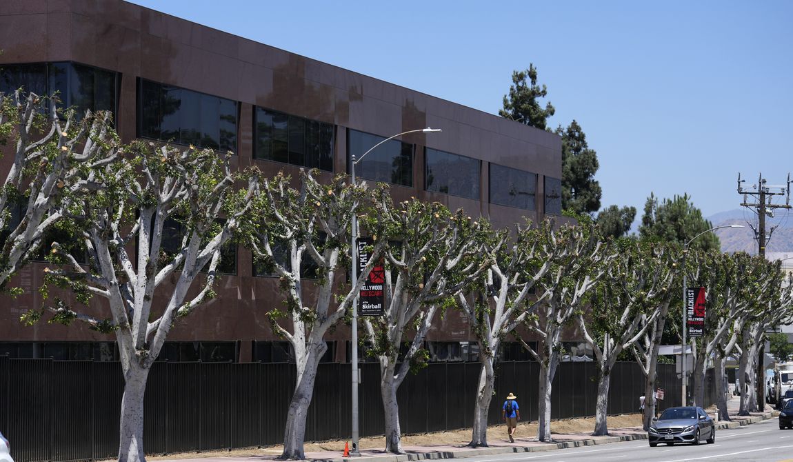Trees are seen outside Universal Studios on Wednesday, July 19, 2023, in Burbank, Calif. The actors strike comes more than two months after screenwriters began striking in their bid to get better pay and working conditions. (AP Photo/Chris Pizzello)