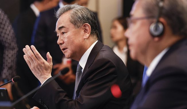 Chinese Communist Party&#x27;s foreign policy chief Wang Yi speaks during Association of Southeast Asian Nations (ASEAN) Plus Three Foreign Ministers&#x27; Meeting at the in Jakarta, Indonesia, Thursday, July 13, 2023. (Mast Irham/Pool Photo via AP)