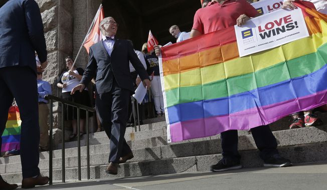 Jim Obergefell, the named plaintiff in the Obergefell v. Hodges Supreme Court case that legalized same-sex marriage nationwide, arrives for a news conference on the steps of the Texas state Capitol, June 29, 2015, in Austin, Texas. The Respect for Marriage Act is an historic bipartisan agreement that reflects a wider acceptance of gay rights in both Congress and the country. The measure would protect the rights of about a half million married couples. It passed the Senate and heads to the House in December 2022 for near-certain approval. (AP Photo/Eric Gay) **FILE**