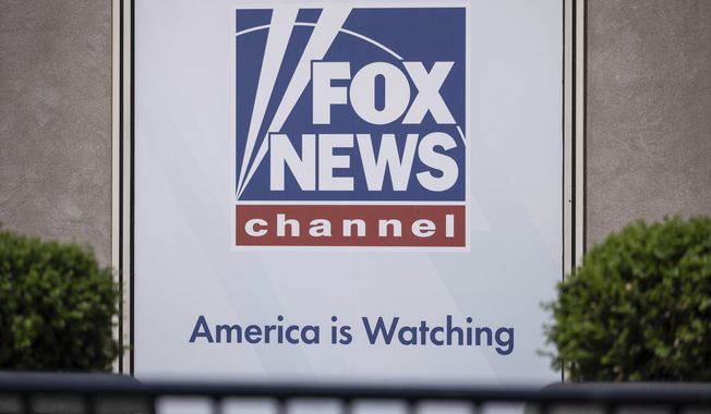 The Fox News logo is displayed outside Fox News Headquarters in New York, April 12, 2023. A former Donald Trump supporter who became the center of a conspiracy theory about Jan. 6, 2021, filed a defamation lawsuit against Fox News on Wednesday, July 12, saying the network made him a scapegoat for the Capitol insurrection. (AP Photo/Yuki Iwamura, File)