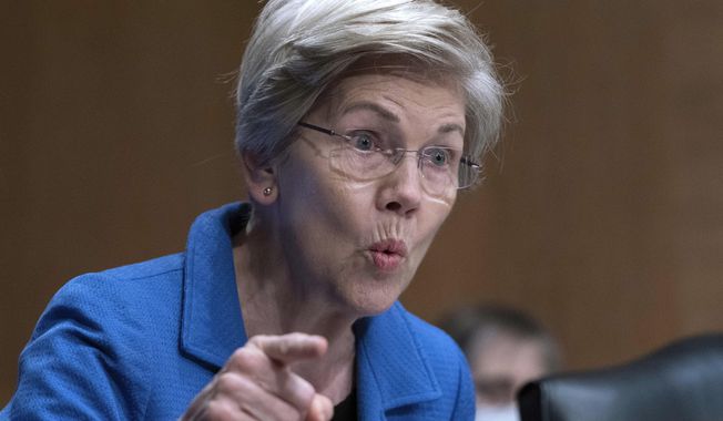 Sen. Elizabeth Warren, D-Mass., speaks during the Senate Committee on Banking, Housing and Urban Affairs hearing on oversight of the credit reporting agencies at Capitol Hill in Washington, Thursday, April 27, 2023. (AP Photo/Jose Luis Magana) **FILE**