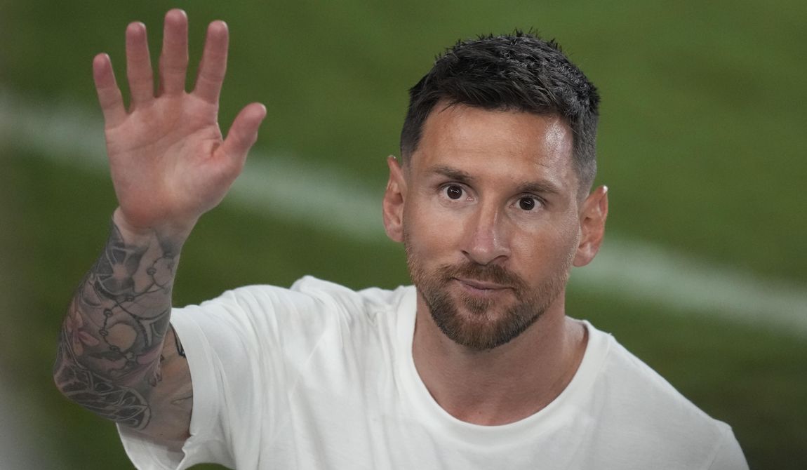 International soccer superstar Lionel Messi waves as he leaves following a celebration to present him to fans one day after his signing with the Inter Miami MLS soccer team, Sunday, July 16, 2023, in Fort Lauderdale, Fla. (AP Photo/Rebecca Blackwell)