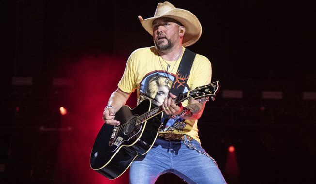 Jason Aldean performs during CMA Fest 2022 in Nashville, Tenn., on June 9, 2022. Country Music Television removed Aldean&#x27;s music video for the newly released single “Try That in a Small Town.&quot; (Photo by Amy Harris/Invision/AP, File)
