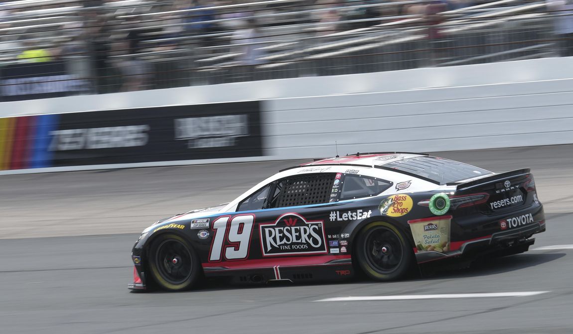 Martin Truex Jr., steers his car into Turn 1 during the Crayon 301 NASCAR Cup Series race, Monday, July 17, 2023, at New Hampshire Motor Speedway, in Loudon, N.H. (AP Photo/Steven Senne)