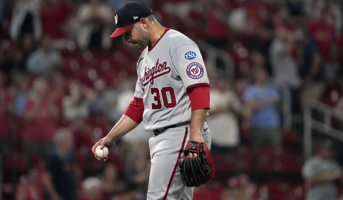 Washington Nationals relief pitcher Paolo Espino pauses on the mound after giving up a solo home run to St. Louis Cardinals&#x27; Nolan Arenado during the eighth inning in the second game of a baseball doubleheader Saturday, July 15, 2023, in St. Louis. (AP Photo/Jeff Roberson)