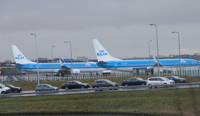 KLM airplanes sit in Schiphol Airport near Amsterdam, Netherlands, on Jan. 18, 2018. Appeals judges in Amsterdam on Friday, July 7, 2023, ruled that the Dutch government can order Schiphol Airport, one of Europe&#x27;s busiest aviation hubs, to reduce the number of flights from 500,000 per year to 460,000. The ruling at Amsterdam Court of Appeal overturned a lower court&#x27;s decision in April that the government did not follow the correct procedure when it called on Schiphol last year to reduce flight numbers. (AP Photo/Peter Dejong)