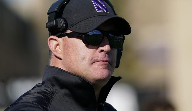 Northwestern head coach Pat Fitzgerald watches his team during the second half of an NCAA college football game against Rutgers in Evanston, Ill., Oct. 16, 2021. Northwestern has fired Fitzgerald Monday, July 10, 2023, amid a hazing scandal that called into question his leadership of the program and damaged the university&#x27;s reputation after it mishandled its response to the allegations. (AP Photo/Nam Y. Huh, File)
