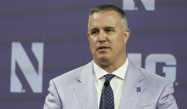 Northwestern head coach Pat Fitzgerald talks to reporters during an NCAA college football news conference at the Big Ten Conference media days, at Lucas Oil Stadium, Tuesday, July 26, 2022, in Indianapolis. Northwestern has suspended coach Pat Fitzgerald for two weeks without pay following an investigation into alleged hazing within the football program. Fitzgerald started serving his suspension on Friday, July 7, 2023. (AP Photo/Darron Cummings, File) **FILE**