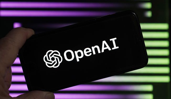 The logo for OpenAI, the maker of ChatGPT, appears on a mobile phone, in New York, Tuesday, Jan. 31, 2023. ChatGPT-maker OpenAI and The Associated Press said Thursday that they&#x27;ve made a deal for the artificial intelligence company to license AP&#x27;s archive of news stories. (AP Photo/Richard Drew, File)