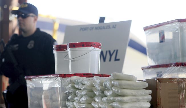 A display of the fentanyl and meth that was seized by Customs and Border Protection officers at the Nogales Port of Entry is shown during a press conference Thursday, Jan. 31, 2019, in Nogales, Ariz. (Mamta Popat/Arizona Daily Star via AP, File)