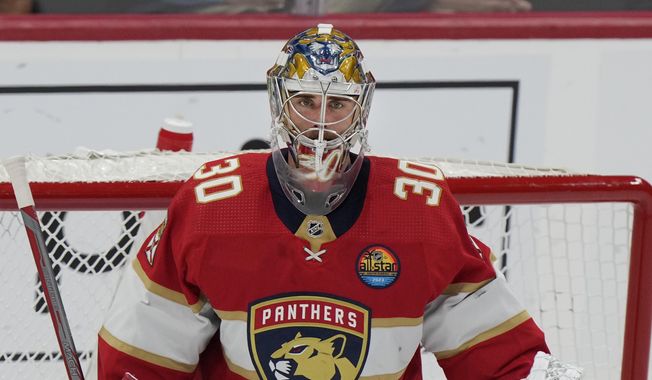 FILE - Florida Panthers goaltender Spencer Knight guards the goal during the second period of an NHL hockey game against the Dallas Stars, Thursday, Nov. 17, 2022, in Sunrise, Fla. Knight has been on the ice this week at a development camp with the Panthers. It&#x27;s the first time he’s been around the team since entering the NHL/NHLPA player assistance program in February. (AP Photo/Wilfredo Lee, File)