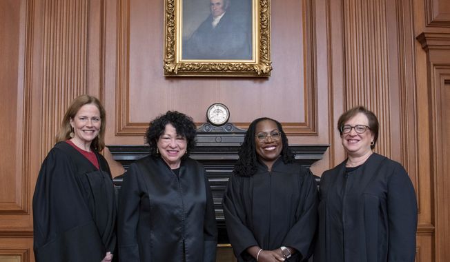 In this image provided by the Supreme Court, from left, Associate Justice Amy Coney Barrett, Associate Justice Sonia Sotomayor, Associate Justice Ketanji Brown Jackson, and Associate Justice Elena Kagan in the Justices’ Conference Room prior to the formal investiture ceremony for Jackson at the Supreme Court in Washington, Friday, Sept. 30, 2022. (Fred Schilling/U.S. Supreme Court via AP) **FILE**