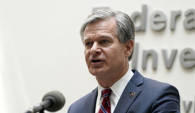 FBI Director Christopher Wray speaks during a news conference, Wednesday, Aug. 10, 2022, in Omaha, Neb. (AP Photo/Charlie Neibergall) ** FILE **