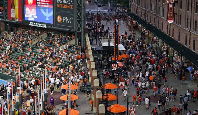 A crowd is seen at Oriole Park at Camden Yards prior to a baseball game between the Baltimore Orioles and the Minnesota Twins, Friday, June 30, 2023, in Baltimore. (AP Photo/Julio Cortez) **FILE**