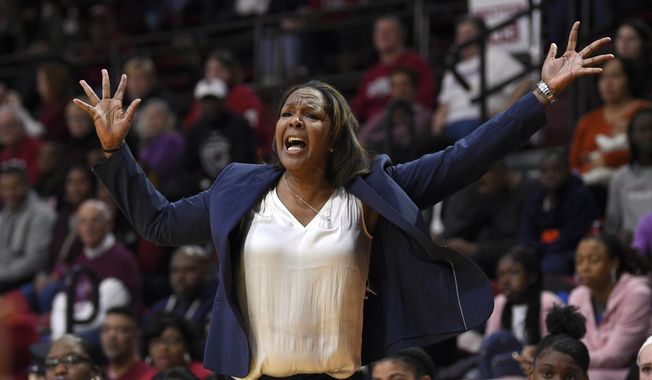 FILE - Temple head coach Tonya Cardoza calls out to her team from the sidelines during the first half of an NCAA college basketball game against the South Carolina, Saturday, Dec. 7, 2019, in Philadelphia. Former Temple head coach Tonya Cardoza is returning to another old job, as an assistant to Geno Auriemma at UConn, the school announced Thursday, July 13, 2013. (AP Photo/Derik Hamilton)
