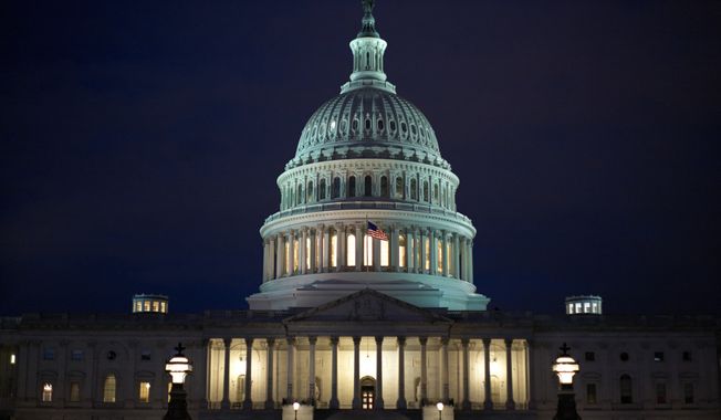 The United States Capitol building, east front, at dawn is seen in this general view, Monday, Jan. 27, 2020, in Washington, DC. (AP Photo/Mark Tenally)  **FILE**