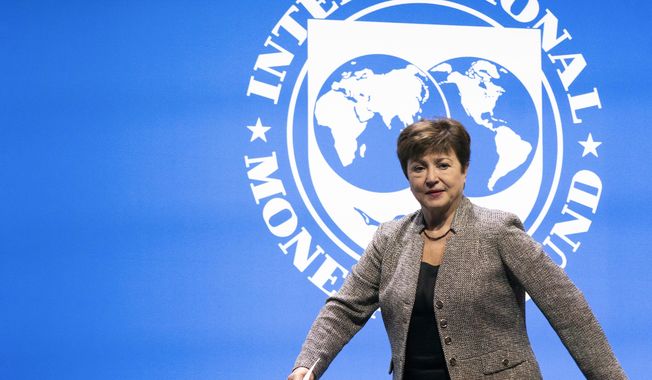 International Monetary Fund Managing Director Kristalina Georgieva walks to the podium during the 2022 annual meeting of the International Monetary Fund and the World Bank Group on Oct. 14, 2022, in Washington. Heads of state, finance leaders and activists from around the world will converge in Paris this week to seek ways to overhaul the world&#x27;s development banks — like the International Monetary Fund and World Bank — and help them weather a warmer and stormier world.(AP Photo/Manuel Balce Ceneta, File)