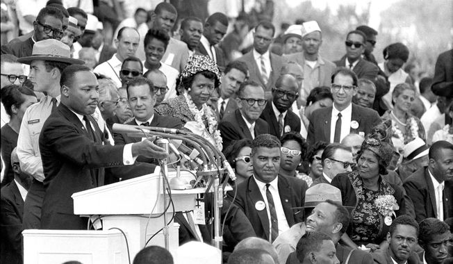 FILE - Martin Luther King Jr., gestures during his &quot;I Have a Dream&quot; speech on Aug. 28, 1963, as he addresses thousands of civil rights supporters gathered in Washington, Norman Hill helped coordinate the March on Washington, where King delivered his historic speech. Afterward, he decided it was time to change tactics. &quot;I left the Congress of Racial Equality in 1964 because I felt a transition needed to be made in the Civil Rights Movement, from an emphasis on protests to engaging in political action,&quot; he said.(AP Photo)