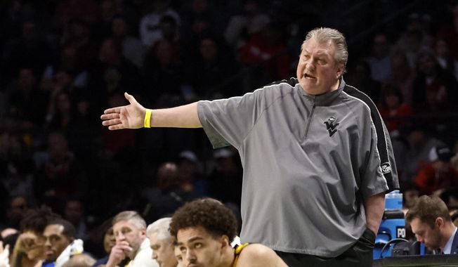 West Virginia head coach Bob Huggins reacts to a call in the second half of a first-round college basketball game against Maryland in the NCAA Tournament in Birmingham, Ala., March 16, 2023. In a statement released Monday, July 10, Huggins said he checked into a rehabilitation facility following a drunken driving arrest and disputes that he resigned at West Virginia, accusing the university of releasing a “false statement” about him stepping down. (AP Photo/Butch Dill, File) **FILE**